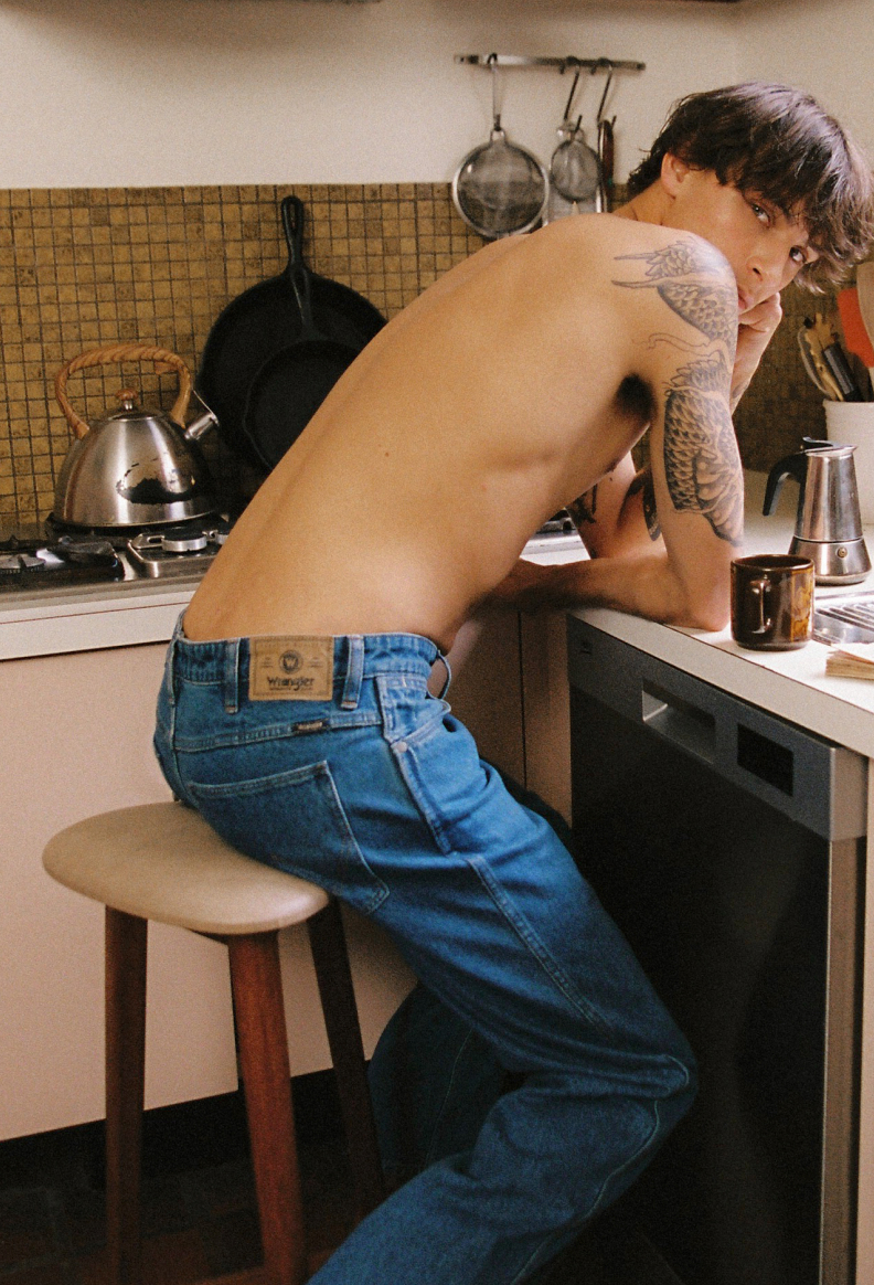 Wrangler Butts Drive Me Nutts campaign image in a retro kitchen