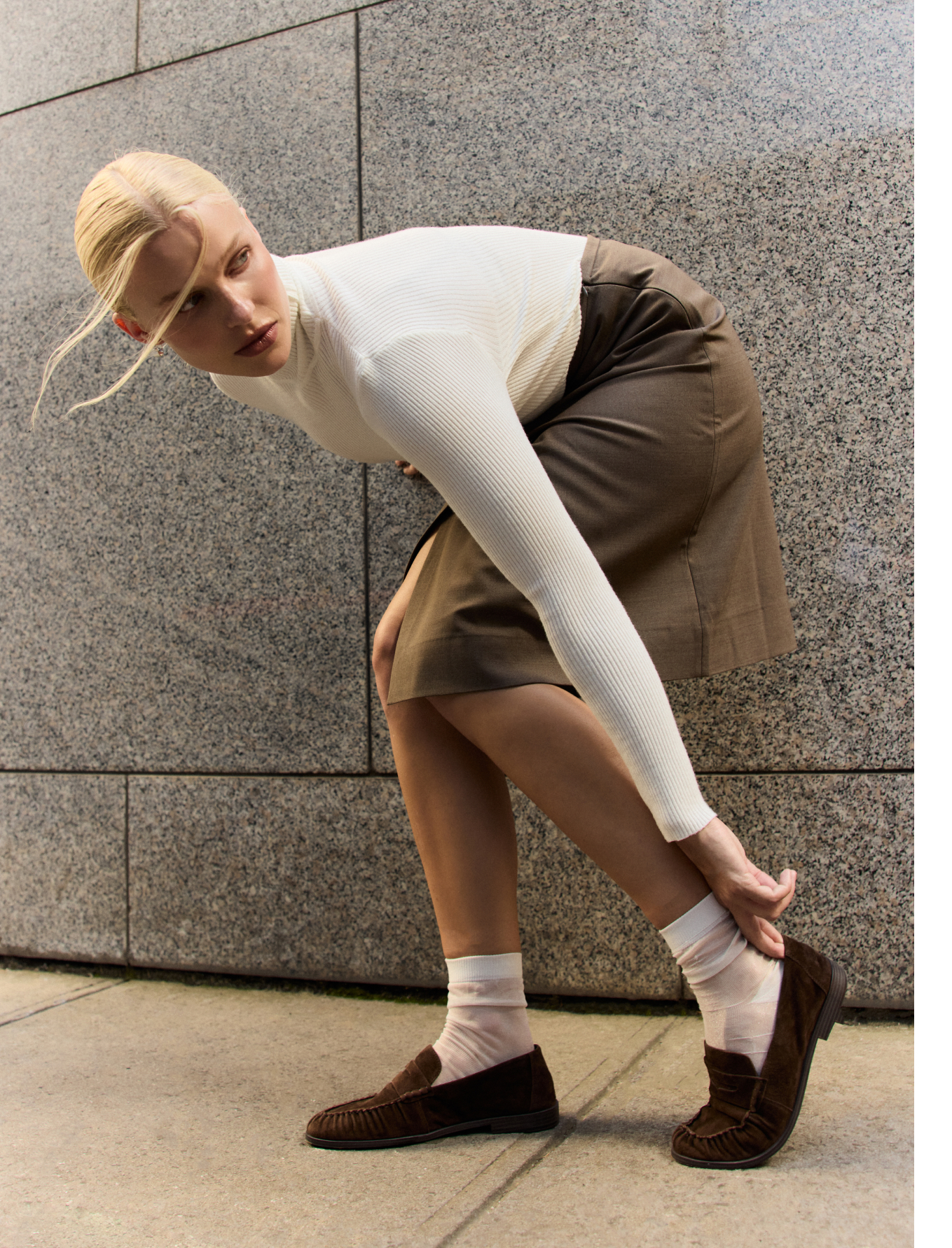 Betts campaign detail of brown loafers styled in the city